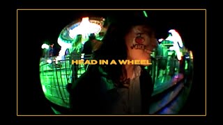 zzzahara – “HEAD IN A WHEEL”