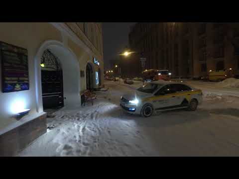 Walking in the snow at night in Moscow
