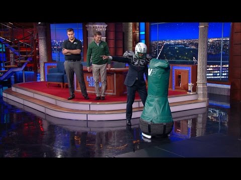 Stephen Colbert Tackles A Football Robot