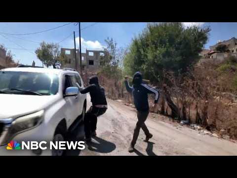 Israeli settlers attack Palestinian woman and NBC News crew