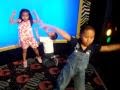 Kids Dancing A Front Of Blue Screen Chuck E Cheese