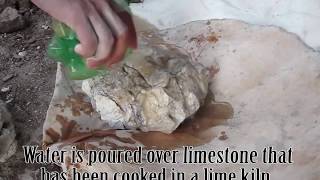 preview picture of video 'Making Quicklime from a Traditional Lime Kiln - Cooked limestone + Water = Quicklime'