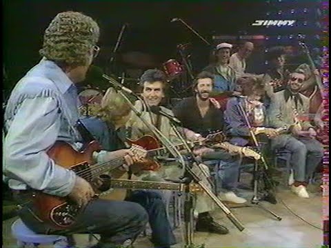 Carl Perkins and George Harrison Eric Clapton Ringo Starr Dave Edmunds Band and Rosanne Cash