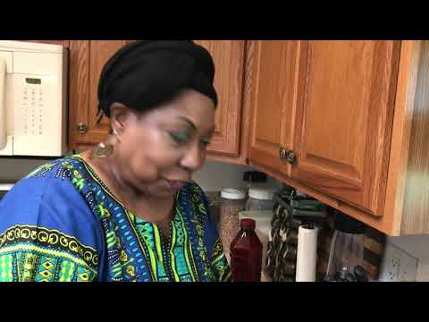 American Lady cooking Nigerian okra soup