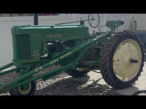 John Deere 60 goes from stuck to free.