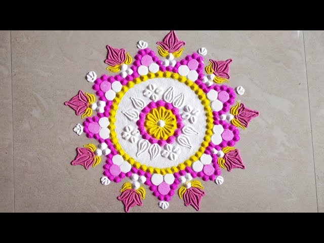 Colorful rangoli design by karishma dighore