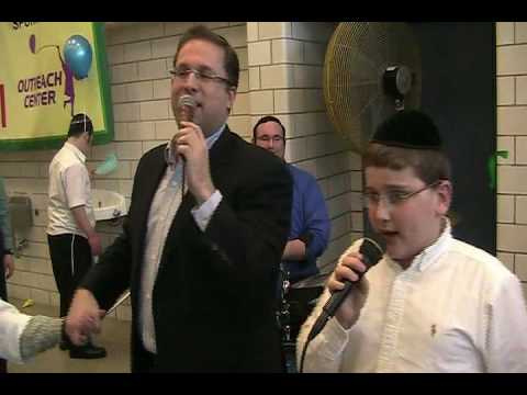 Dovid Dachs Sings Vezakeini, Anovim, And Vehu Keili, With Shloime Dachs At The Tafkid Family Purim Festival Ralph Lebovits on The Drums And Gadi Bodinger on Keys