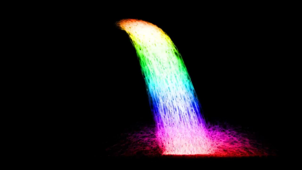 Rainbow waterfall effect pure white of water on the black screen Free Video