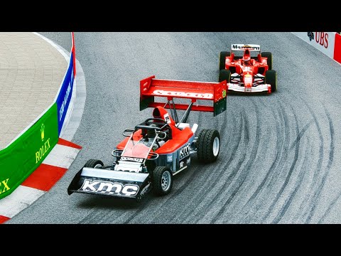 Ferrari F1 2004 vs Prototype Pikes Peak Monster Car - Monaco