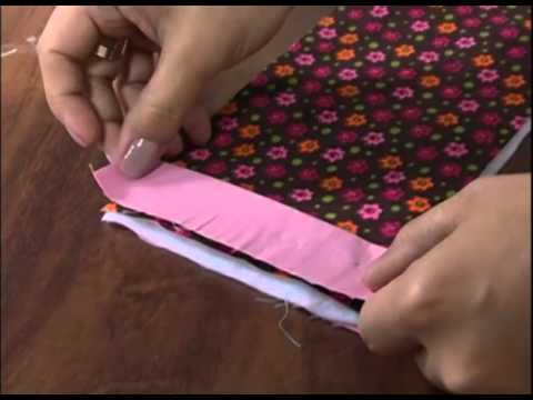 Mulher.com 28/09/2012 Karina Morgado - Porta carregador de celular