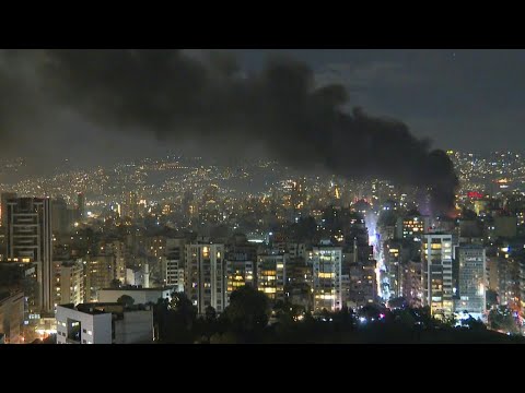 Thick cloud of smoke rises over buildings after an Israeli strike hits centre of Beirut | AFP