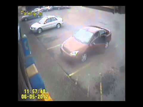 Old man drives car through window and brick wall at mini market