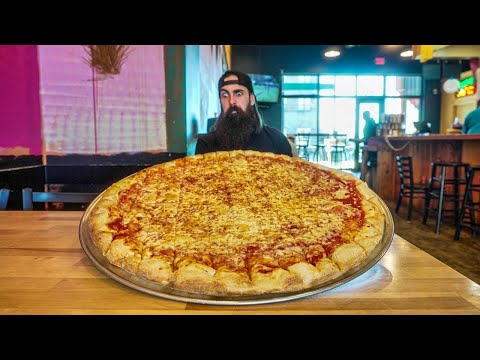 Eating Challenge at Benny's Pizzeria: Can You Finish the 28-Inch Pizza in 28 Minutes?