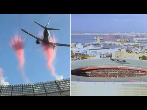 Moment two airliners soar over packed stadium in spectacular pre-game flyover : VIDEO