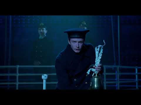 Trailer still for a revival of Titanic the Musical showing the ensemble poised on a ship-like set, suggesting the album’s choral sweep and orchestral scale