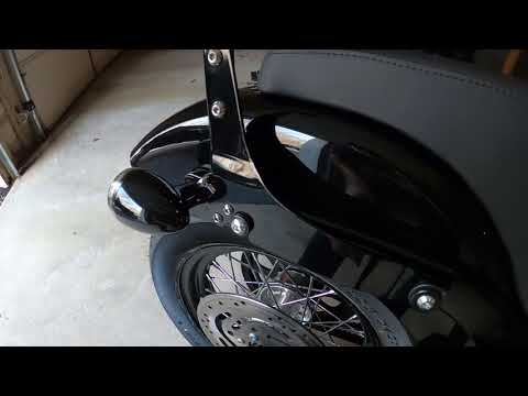 2021 street bob with saddle man seat and cobra sissy bar.