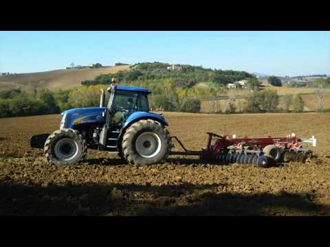 NEWHOLLAND T8040 con erpice a dischi Jean de Bru