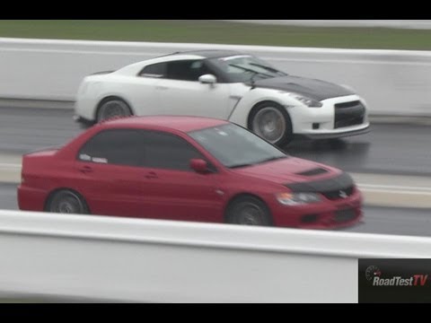 Thumbnail for Switzer GTR R900 vs 800 HP Mitsubishi Evo  - Drag Race Video - Road Test TV ® by Car