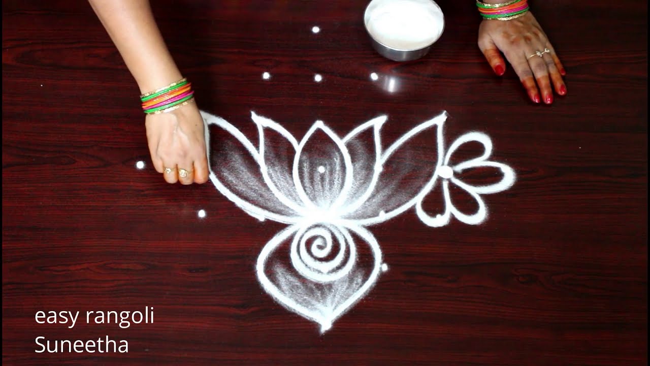 traditional rangoli design lotus flower by suneetha