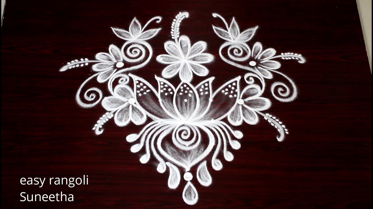 traditional rangoli design lotus flower by suneetha