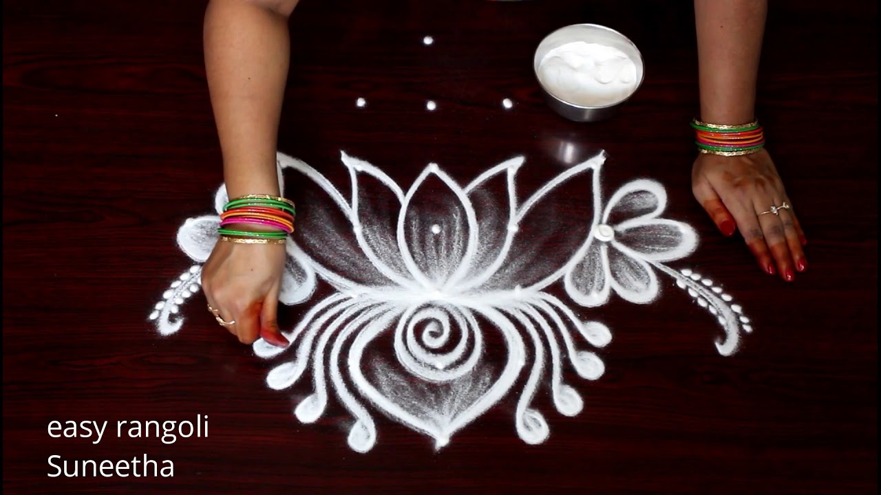 Traditional rangoli design lotus flower by suneetha