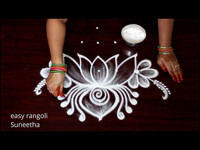 Traditional rangoli design lotus flower by suneetha