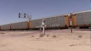 preview picture of video 'BNSF Needles sub - auto train - Danby Station Crossing June 16 2012'
