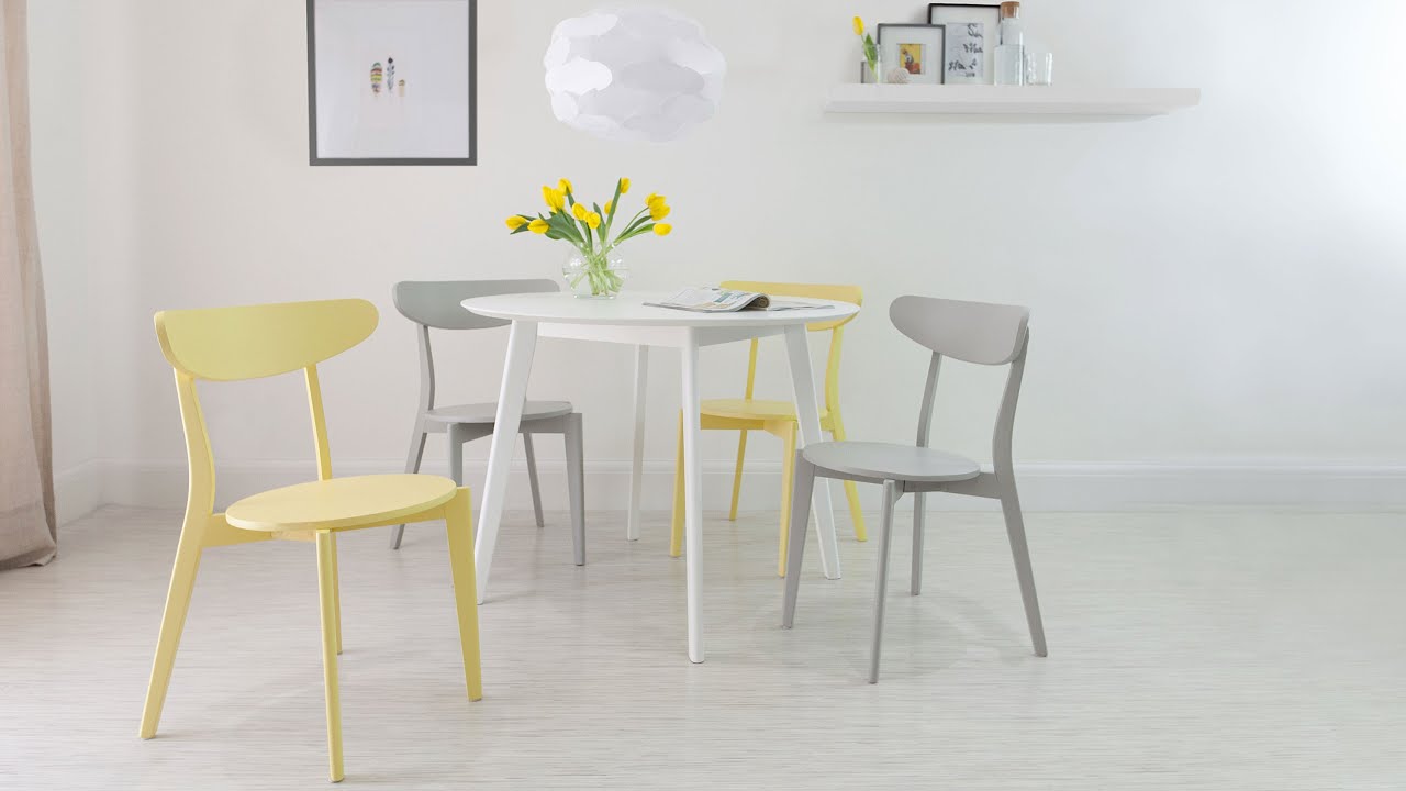 4 Seater White Round Dining Table and Modern Dining Chairs