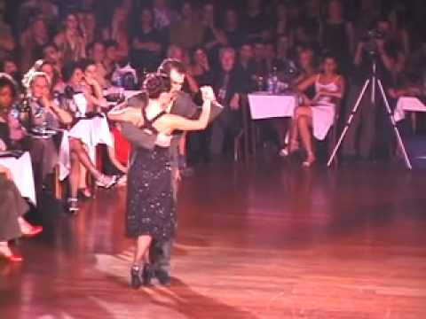  Ezequiel Paludi  and  Sabrina Masso  are  dancing  to  the  tango  "  Mala Junta  "