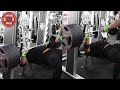 Larry Wheels Benching On A Smith Machine