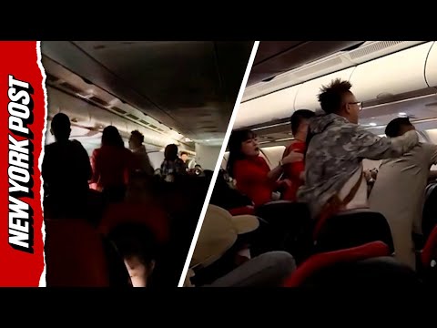 Passengers fight mid-air after group of women refuse to stop talking after plane lights dim
