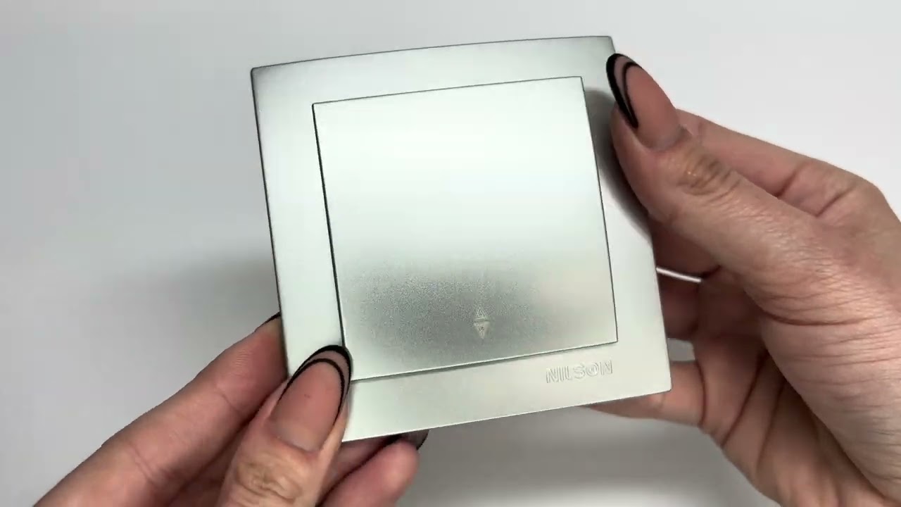 Вимикач прохідний одноклавішний NILSON Touran срібло 24131007