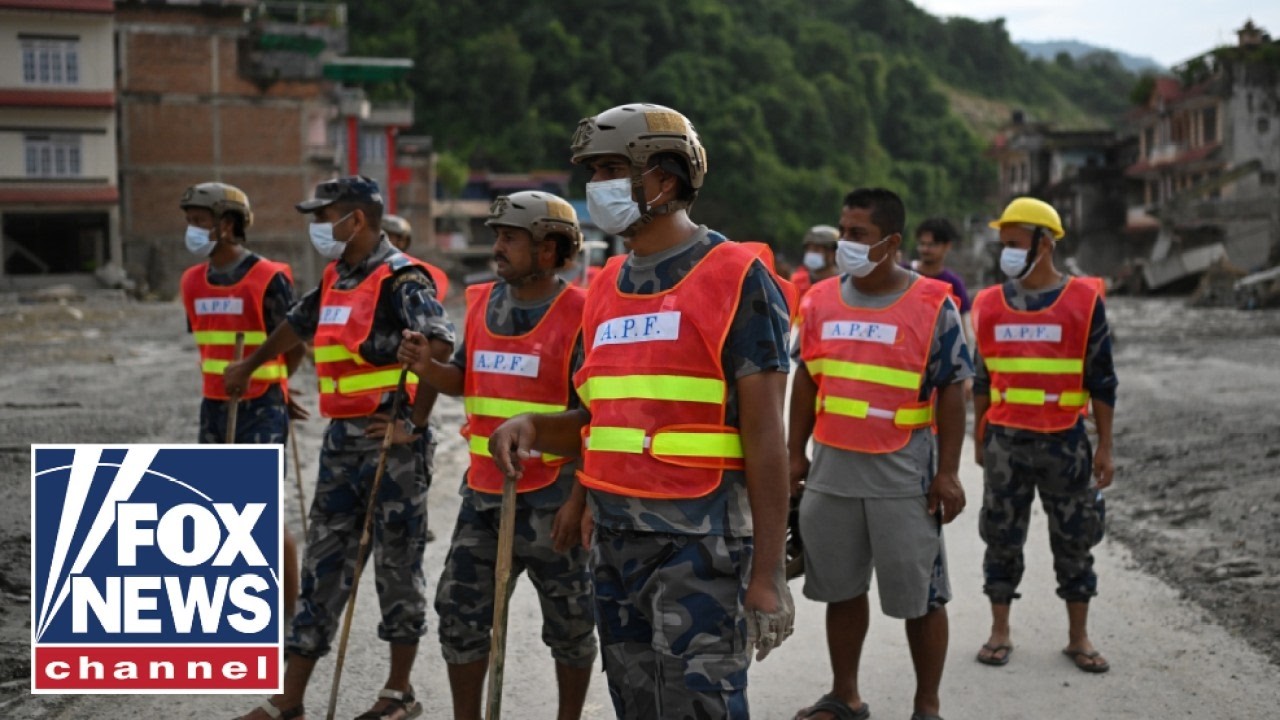 Rescue teams RACE to survivors after deadly Nepal floods