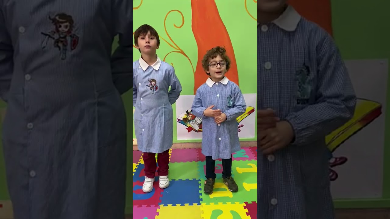 Con il grembiulino e in vernacolo: 