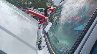 CARLOS MUNOZ WITH HIS 1985 CHEVY TRUCK