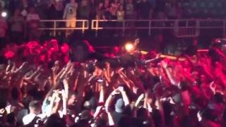 Bruce Springsteen dives into the Mosh Pit during a concert