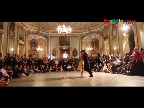  Alejandra Hobert  and  Adrian Veredice  are  dancing  to  the  tango  "  Trago Amargo  "  by  Juan D'Arienzo  at  Catania Tango Festival  in  2017