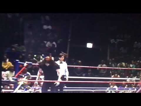 BRET  "THE HITMAN" HART GIVES THE UNDERTAKER A HARD TIME.....1992