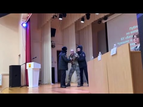 A veteran of the operation was chased off stage by police for telling the truth about hospitals.
