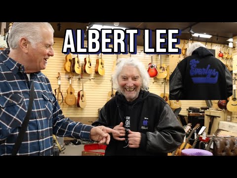 Albert Lee wearing a custom Everly Brothers Jacket at Norman's Rare Guitars