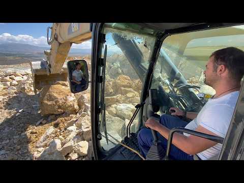 Cat 390D Excavator Loading Blasted Rocks On Cat 775E Dumper & Trucks - Pyramis Ate