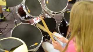 Kids playing Boulevard of Broken Dreams