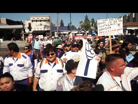Disneyland workers threaten resort 'shut down' with strike action | AFP