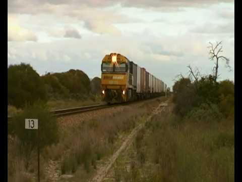 Pacific National Freight Train, Locomotive NR101, Travelling north of Coonamia, Australia.