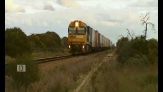 preview picture of video 'Pacific National Freight Train, Locomotive NR101, Travelling north of Coonamia, Australia.'