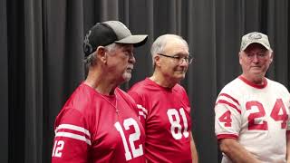 Representatives from the 1966 state champ football team impart wisdom to our student body.