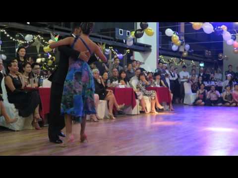  Sebastian Achaval  and  Roxana Suarez  are  dancing  to  "  La rumbita candombé  "  by  Francisco Canaro  at  Singapore International Tango Festival  in  2016