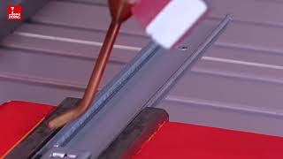 Automated grease spraying in furniture production