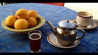 preview picture of video 'Drinking tea in the cafe by the Roman Amphitheatre in El Djem (El Jem) in Tunisia.'