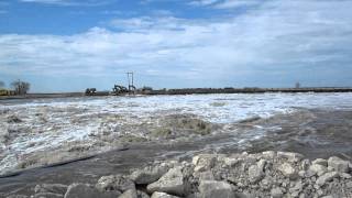 preview picture of video 'Portage Diversion Flood waters from Assiniboine river to Lake Manitoba 2'